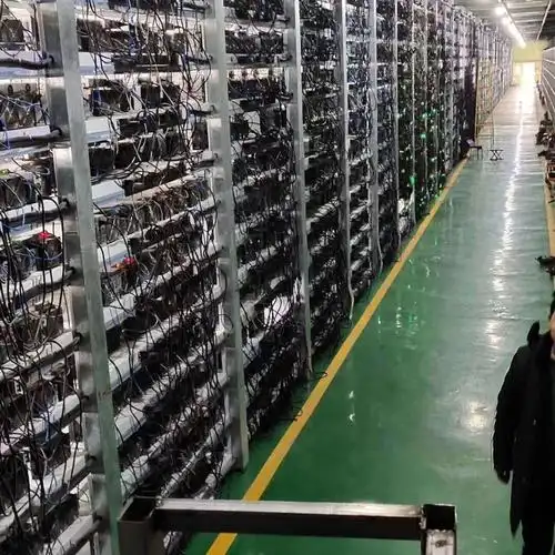 A large mining farm with rows of mining rigs.